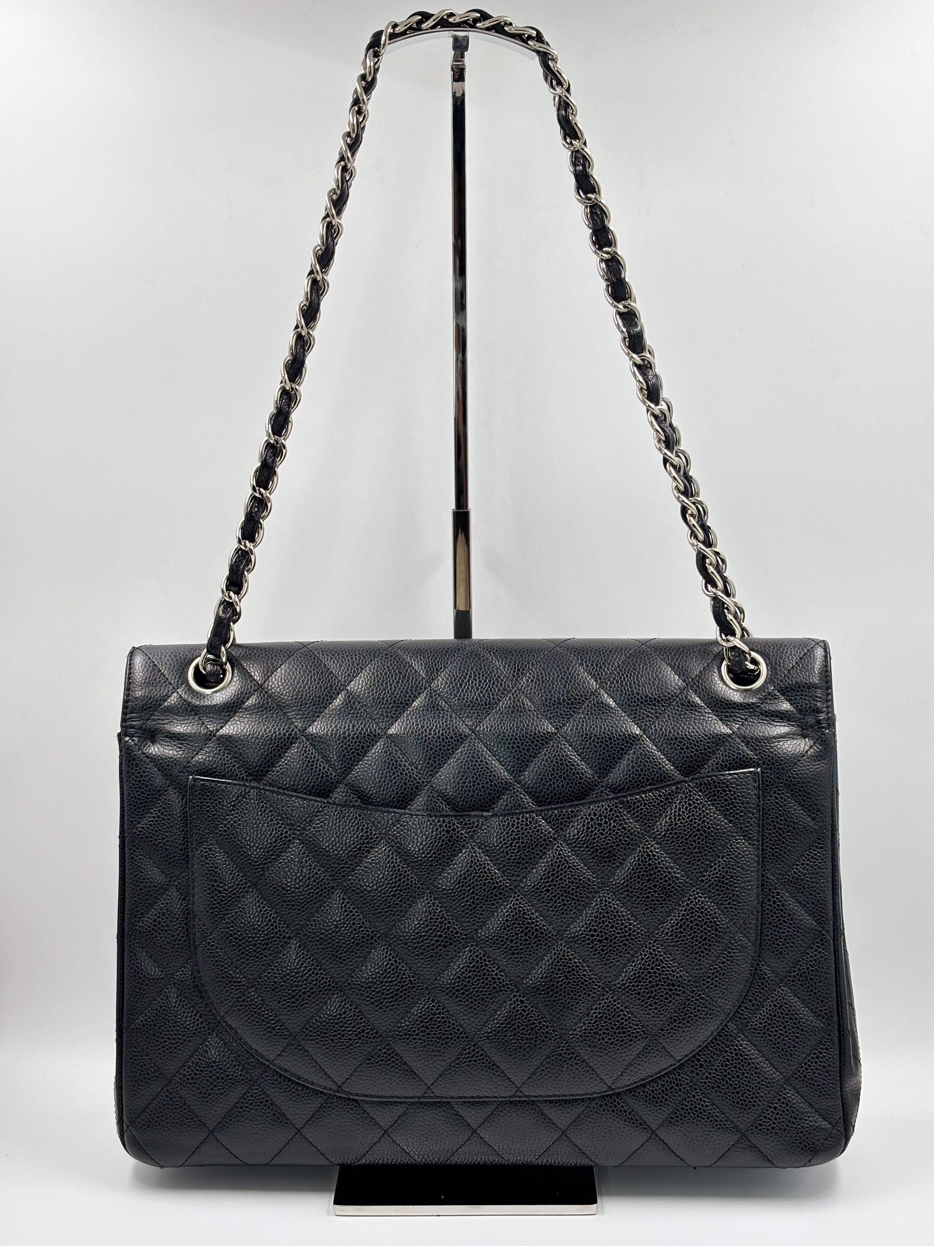 Chanel Black Quilted  Caviar Leather Classic Maxi Double Flap Bag