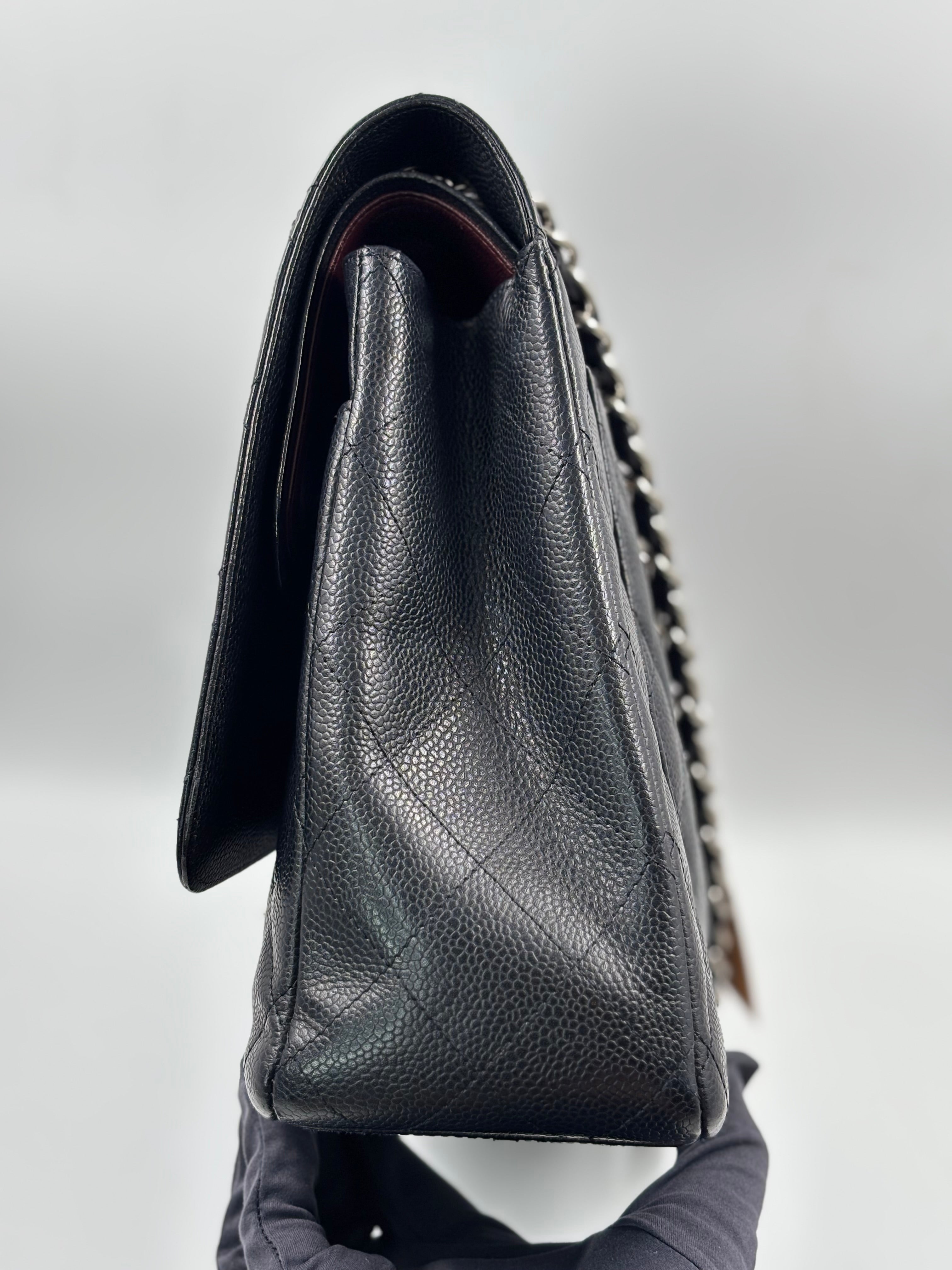 Chanel Black Quilted  Caviar Leather Classic Maxi Double Flap Bag