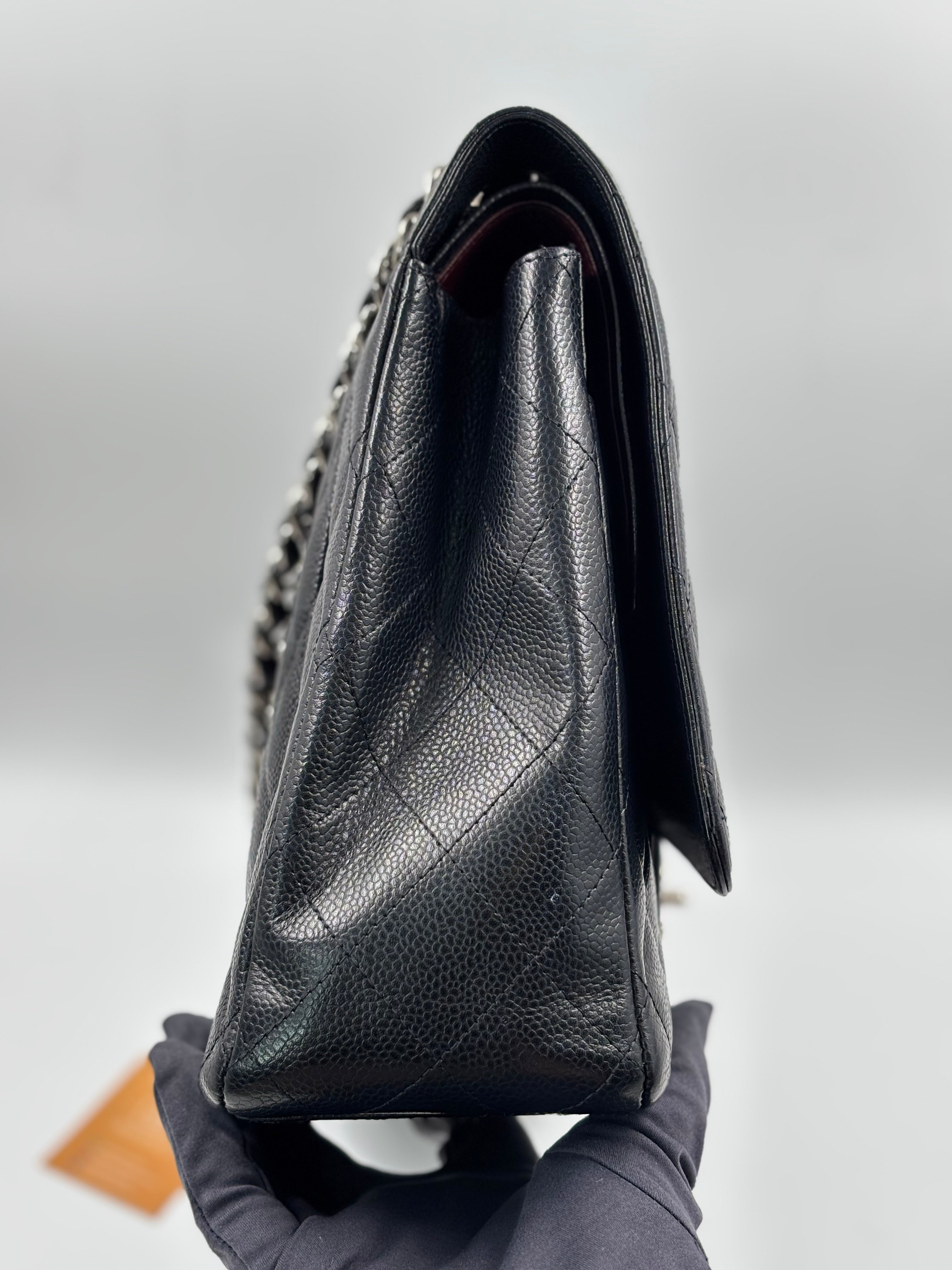 Chanel Black Quilted  Caviar Leather Classic Maxi Double Flap Bag