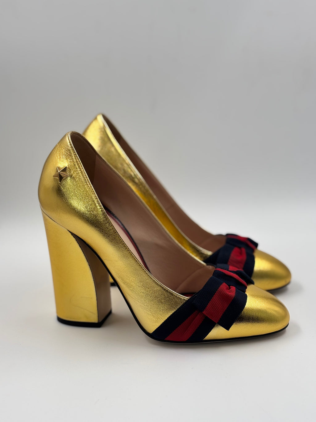 Gucci Metallic Gold Web Bow Block Heel Pumps