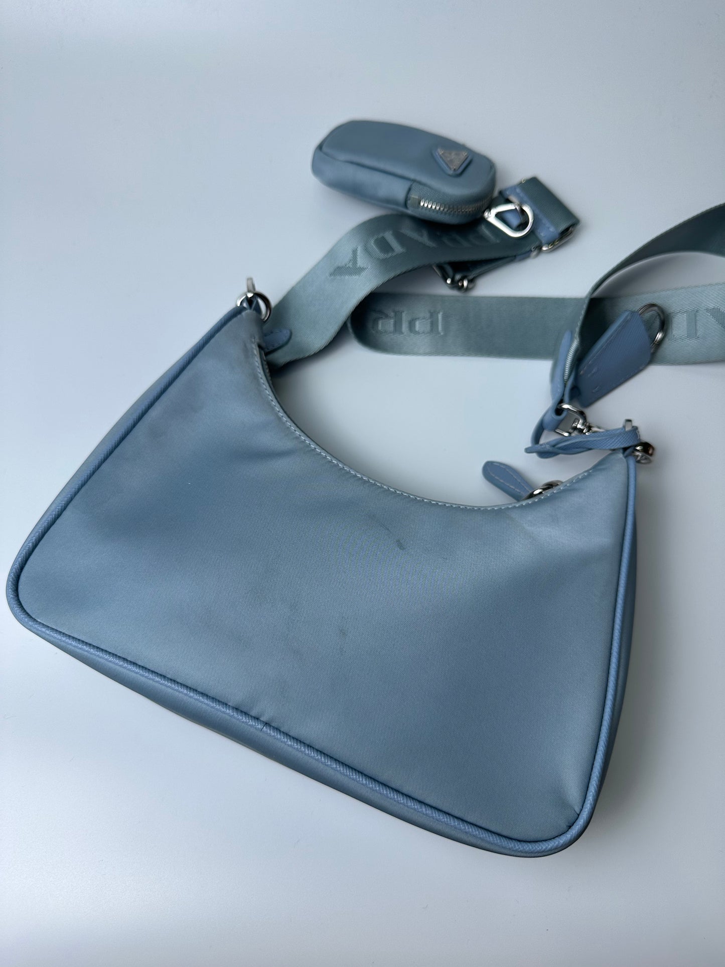 PRADA MULTI POCHETTE LIGHT BLUE